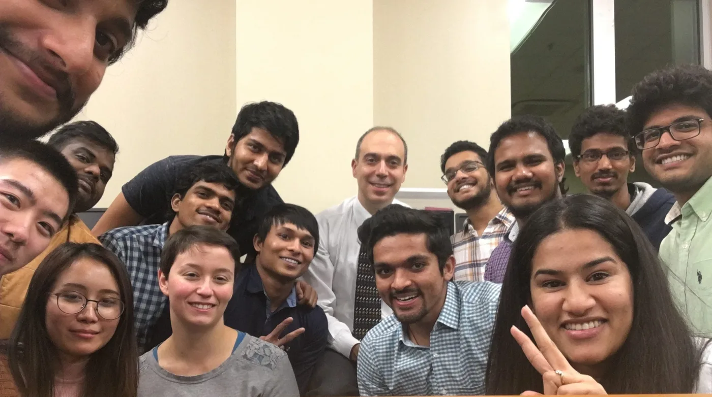 Ed with students in a classroom selfie